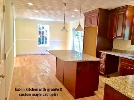 kitchen and eating area before appliances